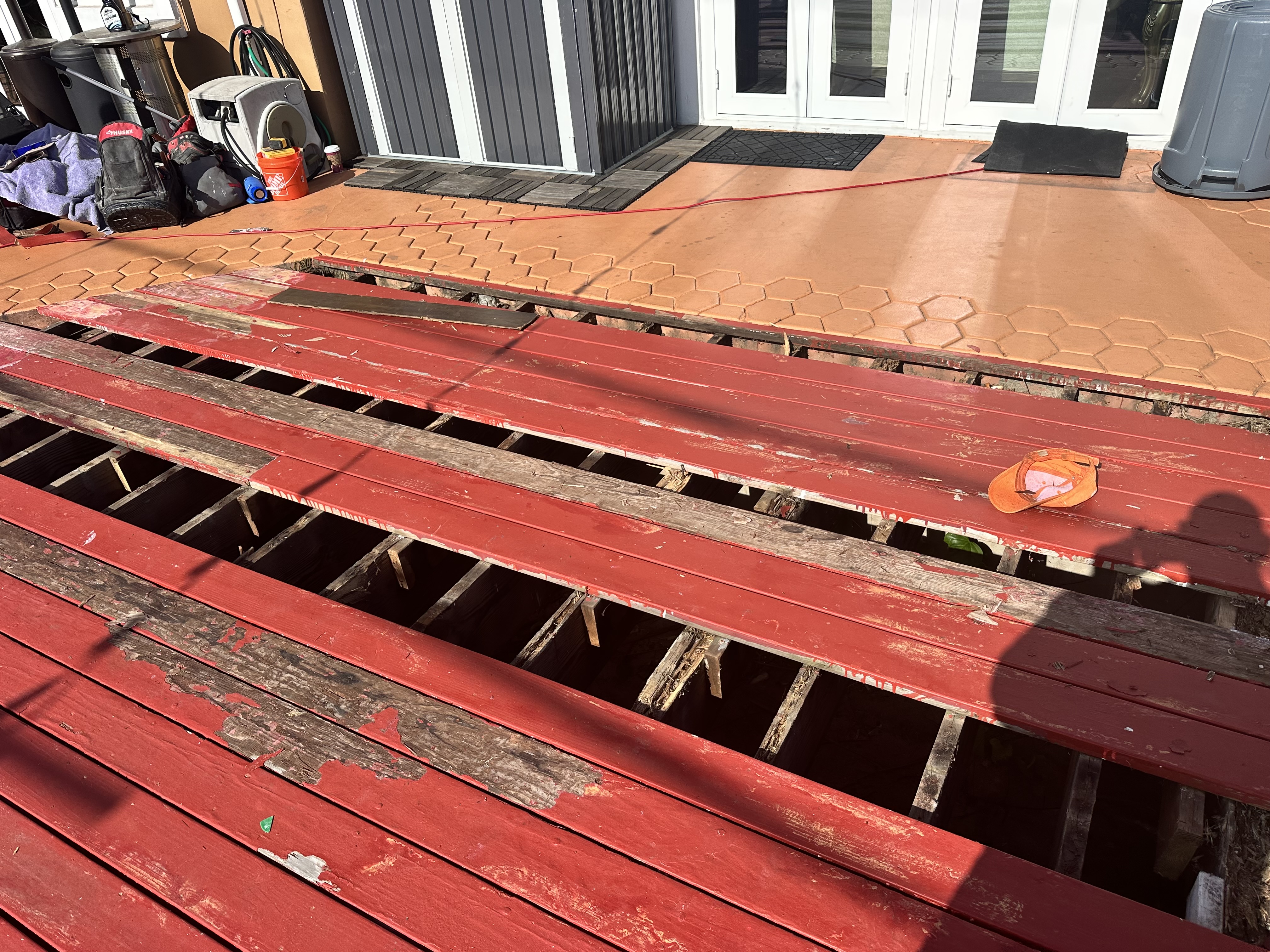 Close-up of termite damage during deck teardown