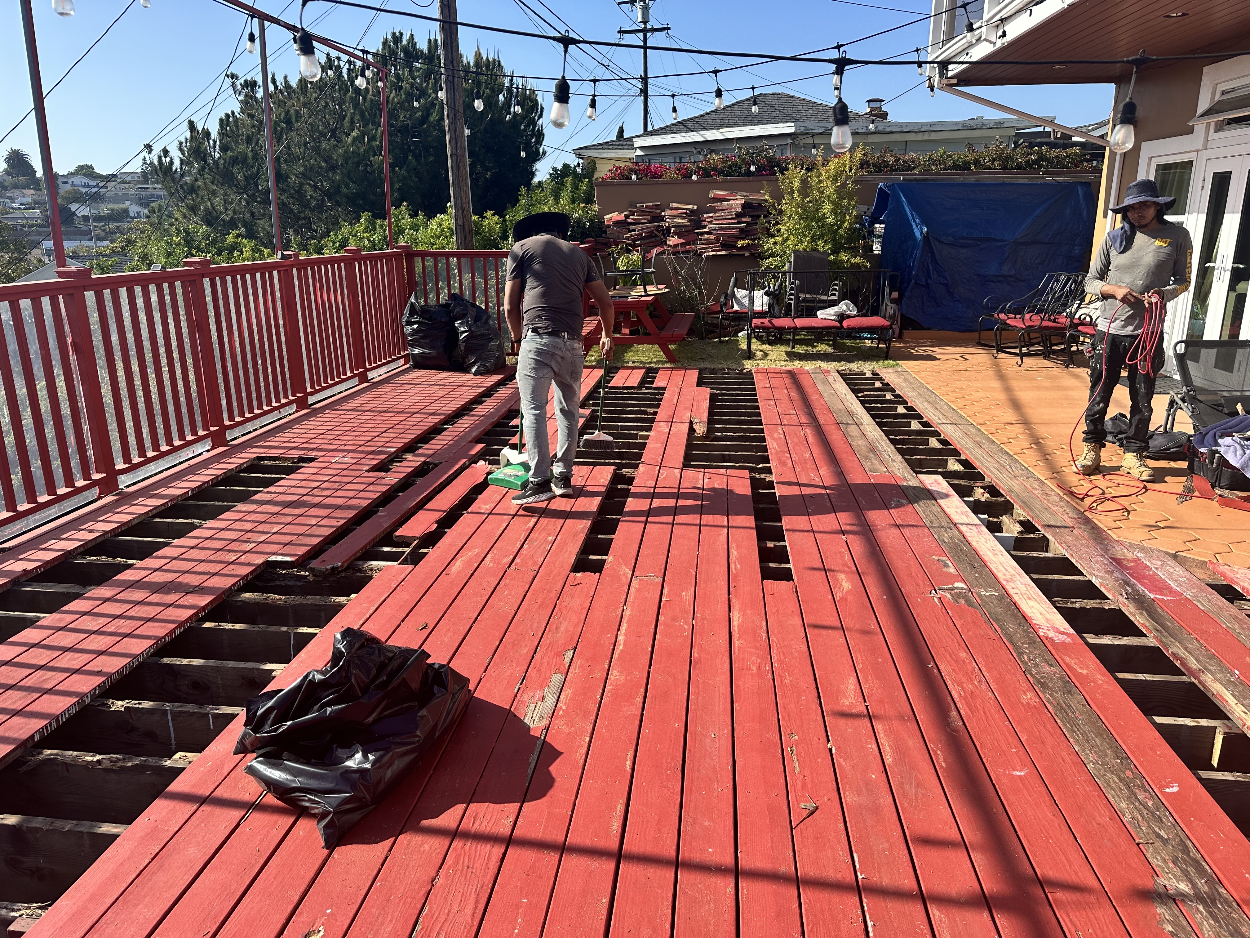New prime wood deck boards installed